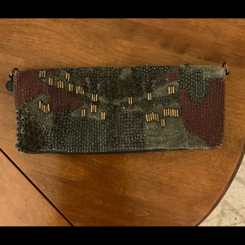 Hand embellished black leather clutch